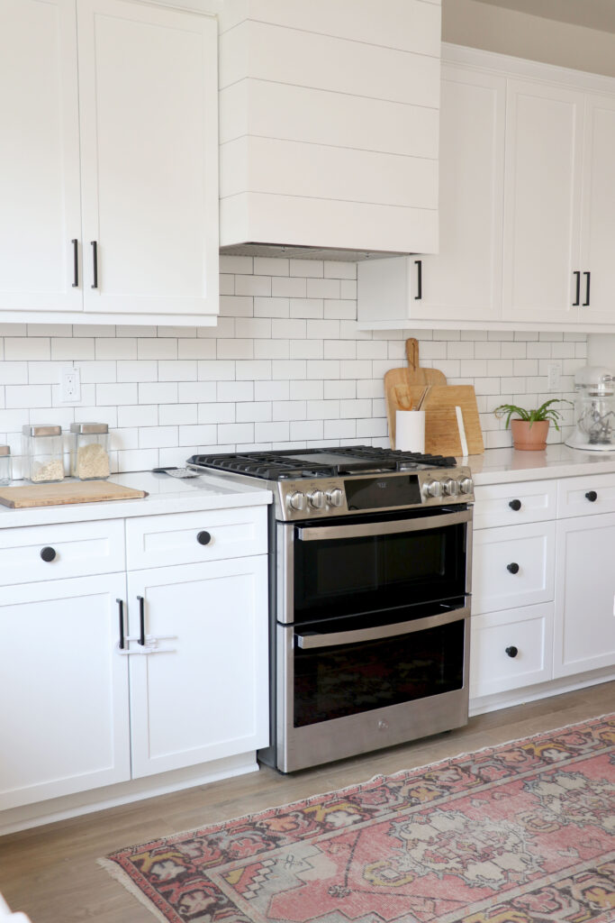 White Farmhouse Kitchen with Shiplap Hood Cover