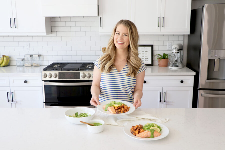 Megan holding salmon recipe.
