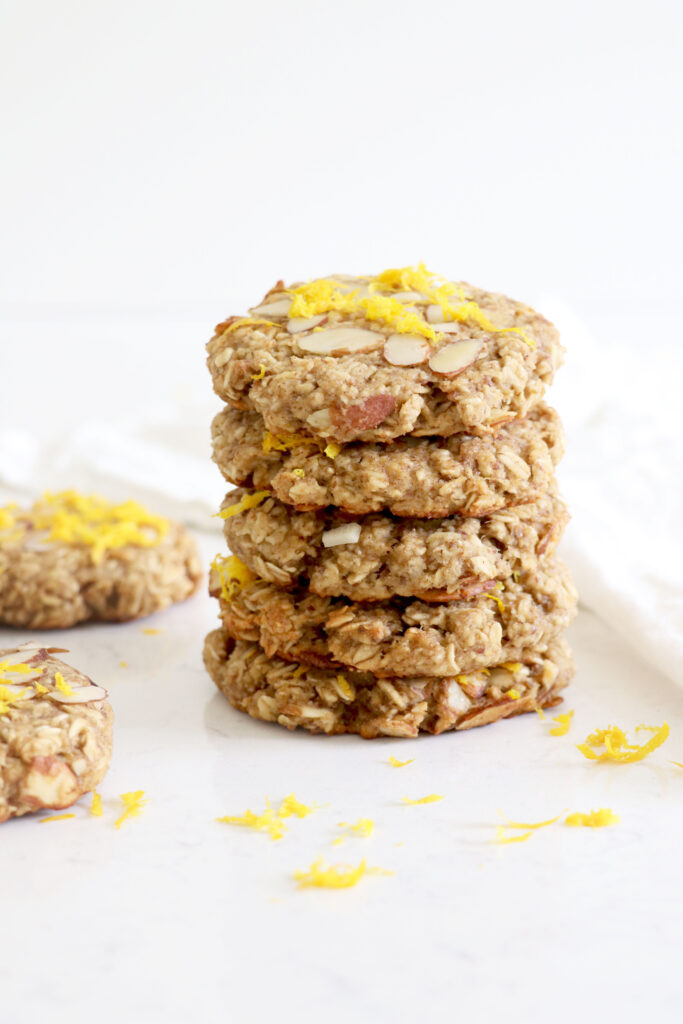Stack of oatmeal breakfast cookies topped with orange zest.